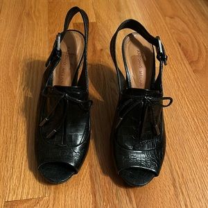 Sling back, open toed heels